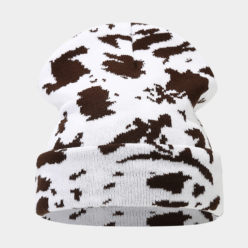Moda europea y americana Nueva leopardo Jacquard sombrero de punto engrosado cálido hombres y mujeres otoño e invierno Gran circunferencia de la cabeza protección del oído sombrero de lana