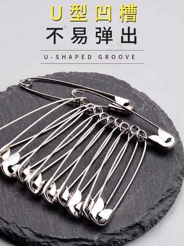 Old-fashioned safety pins to fix clothing buckle pins, small, large, oversized paper clips, paper clips, bed sheet closing pins