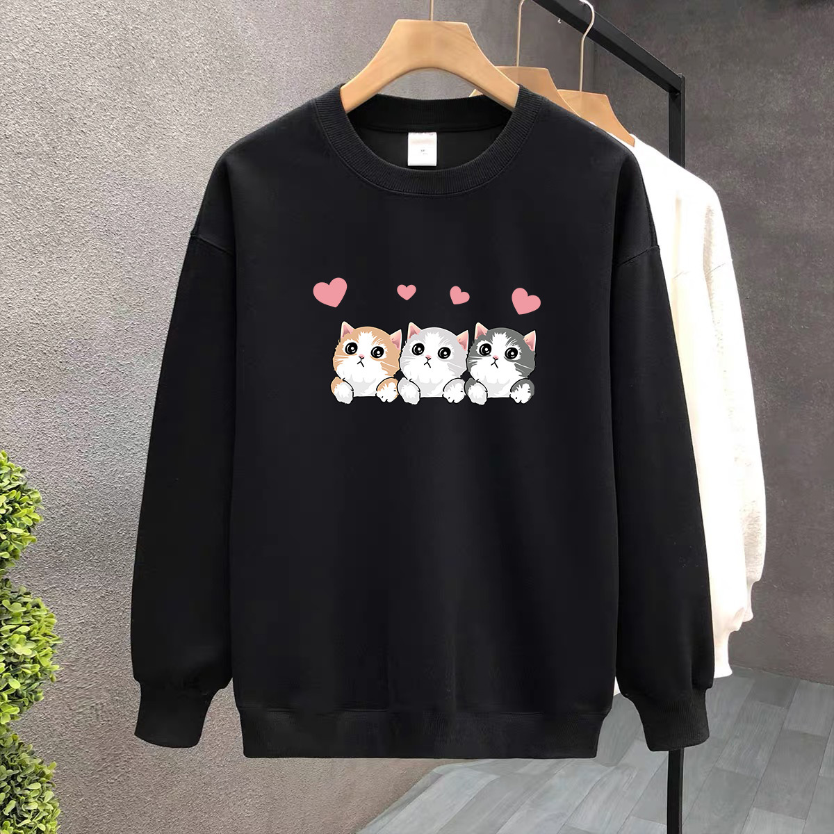 Suéter de algodón negro pesado de alta gama para mujeres 2025 otoño y invierno nuevo estilo europeo y americano camiseta de manga larga fondo suéter de estudiante