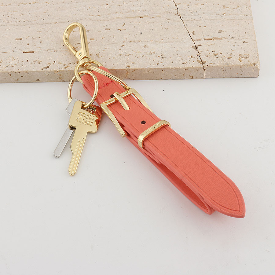 Xiaohongshu ins estilo explosivo uim caja de llaves de cuero colgante llavero de coche colgante pequeño de moda para hombres y mujeres