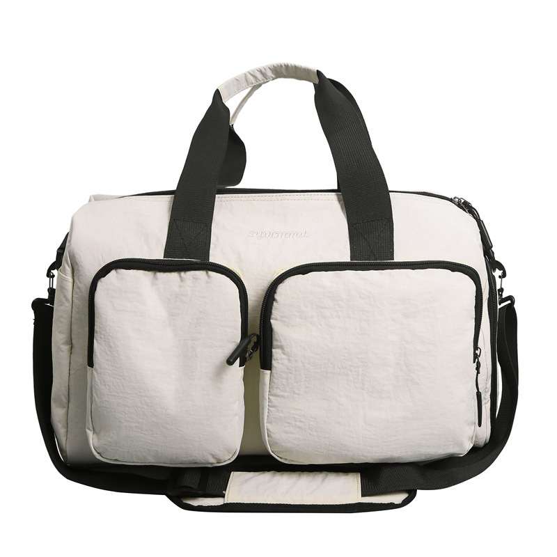 Bolsa deportiva de acondicionamiento físico de gran capacidad para mujeres bolsas de viaje corto bolsas de mano 2025 nuevas bolsas domésticas almacenables