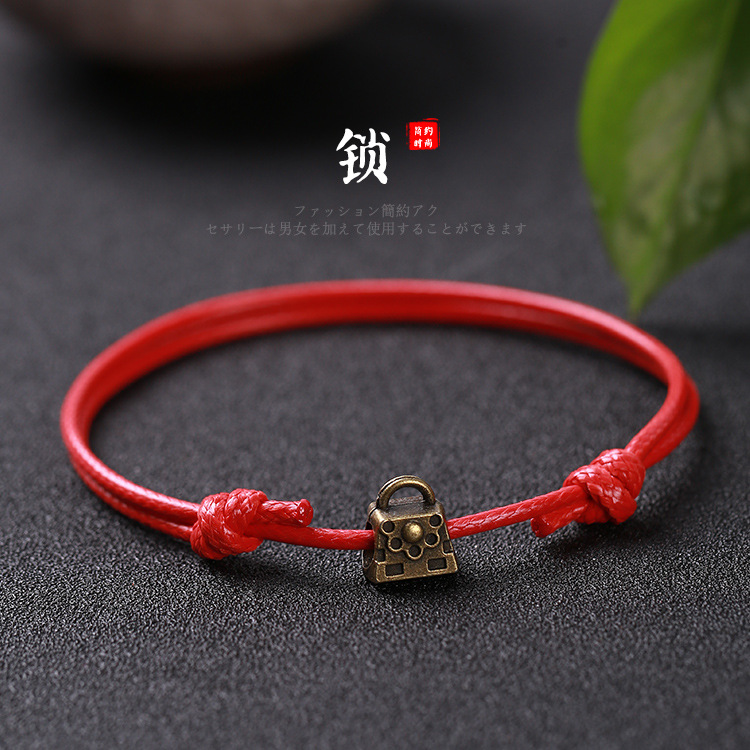 Pulsera tejida a mano – motivos trébole/póker, estilo unisex vintage