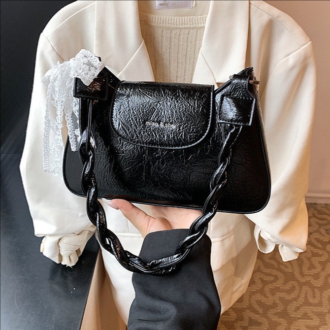Bolso de axila de fuego súper transfronterizo 2025 nuevo bolso de mujer salvaje bolso cuadrado pequeño de moda bolso de hombro coreano bolso de mensajero de cercanías