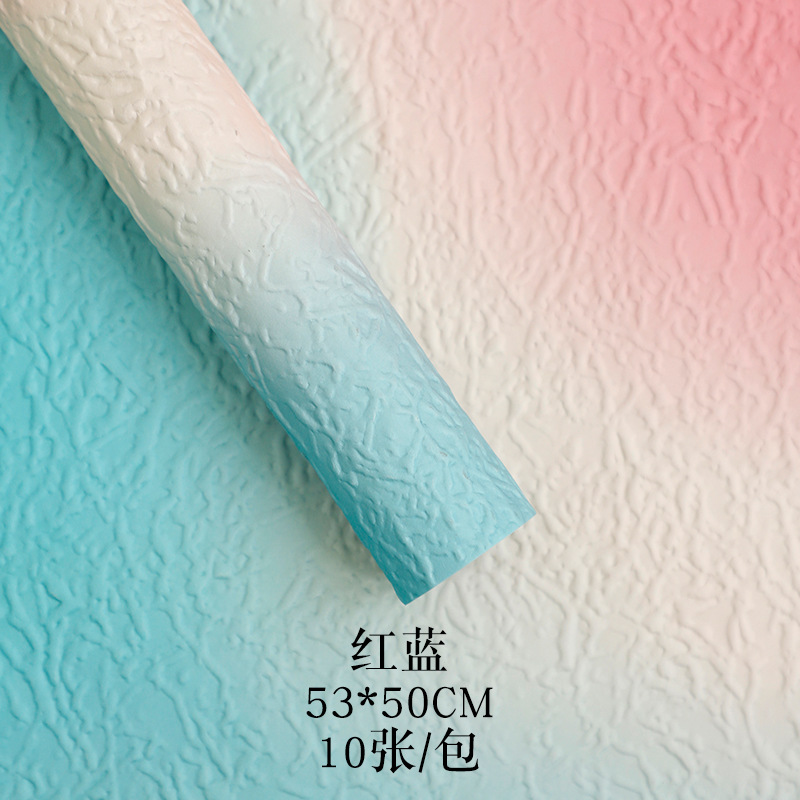 Huaxi Qixi Día de San Valentín Gradiente piedra papel de embalaje de flores arco iris azúcar de alto nivel sensación de ramo de flores papel de embalaje floral