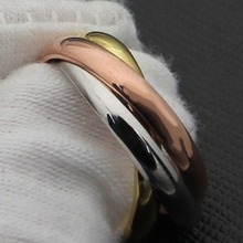 低价厂价外贸饰品批发韩饰刻字18K金钛钢卡三环三色经典戒指