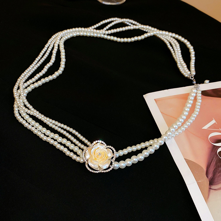 不規則な長いタイプの真珠のネックレスのフランス式の軽い豪華な気質のセーターのチェーンの小さい大衆のシンプルで高級感の項は卸売りの女性を飾ります。