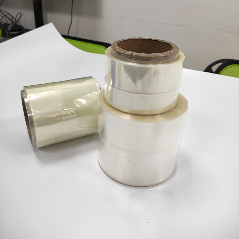 Película de etiqueta transparente al por mayor de fábrica conjunto de película retráctil reticulada etiqueta impresión en color etiqueta caliente Película botella boca película protectora transparente