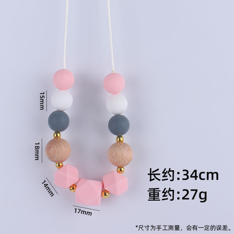 Los nuevos bebés de contraste de color de silicona octogonal mordedor collar de los bebés mordedor palo masticable colgante collar