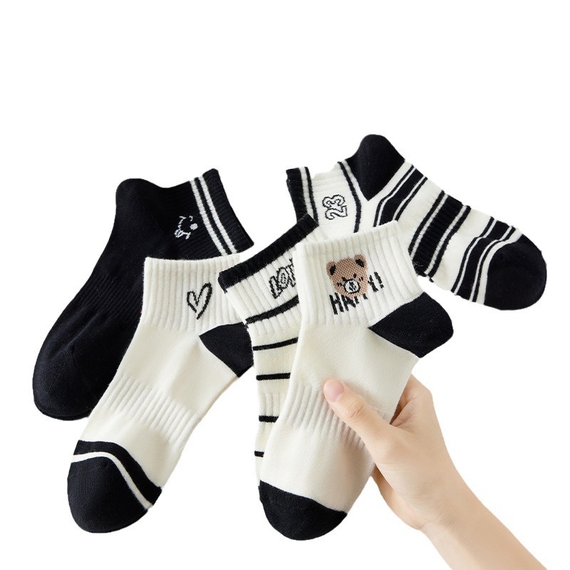 Calcetines de color sólido blanco y negro calcetines de mujer Calcetines Zhuji calcetines al por mayor calcetines desechables desodorante absorbente de sudor barco Calcetines hombres