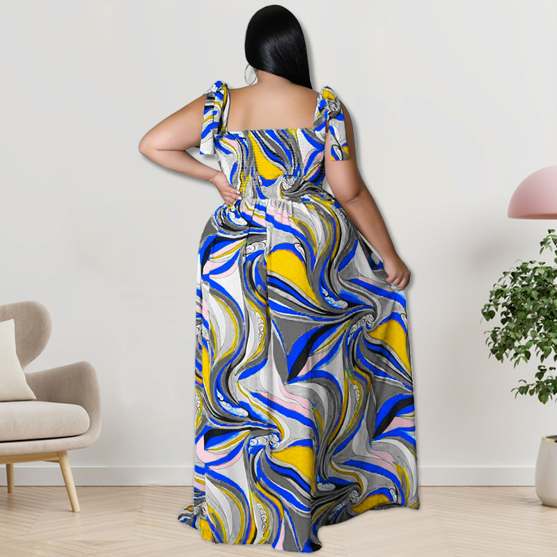 Maxi jurk met spaghettibandjes en smockwerk en strikprint_voghion.com