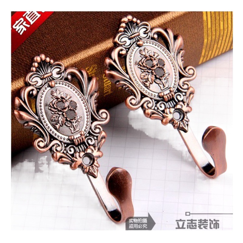 Gancho de la cortina de perforación gancho de pared rosa de aleación de zinc galvanoplastia accesorios de alta gama Europea cortina gancho de pared corbata cuerda de la venta caliente