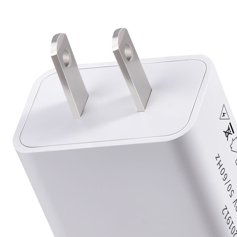 5V2A cargador de arroz 5V1A estándar americano multi-función de puerto único USB Android teléfono móvil carga cabeza adaptador de corriente