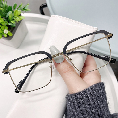 Anti-blue light glasses, black-frame men's style—cool and edgy eyewear with flat lenses, perfect for guys who play the field—online options available for prescription frames.