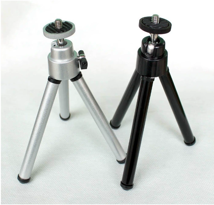 Small handheld tripod, digital CCTV camera, phone holder, projector, clips included