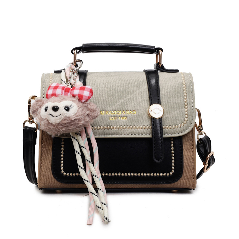 Bolso de mano doble estilo inglés de estilo extranjero 2025, otoño y invierno nuevo estilo de bolso de mujer relajado, bolso de hombro casual.