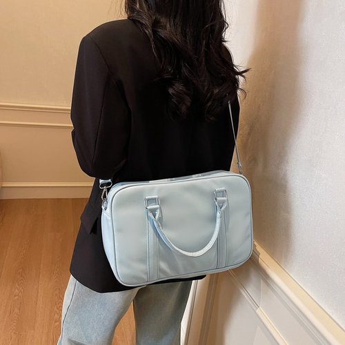 A Korean high-end, niche underarm bag for women, 2025 spring and summer fashion, retro, single-shoulder, versatile, hand-held.