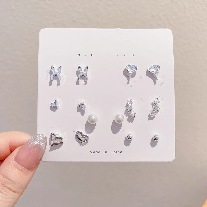 Pendientes de aro lisos para mujer, lujo ligero, pendientes de alta gama, pendientes populares, aretes de diseño exclusivo, aretes de otoño e invierno al por mayor