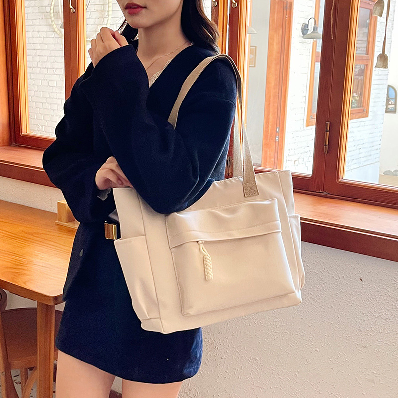 새로운 일본 토트 백 여성 통근 대용량 어깨 가방 고급 질감 대학생 클래스 올 매치 언더암 가방