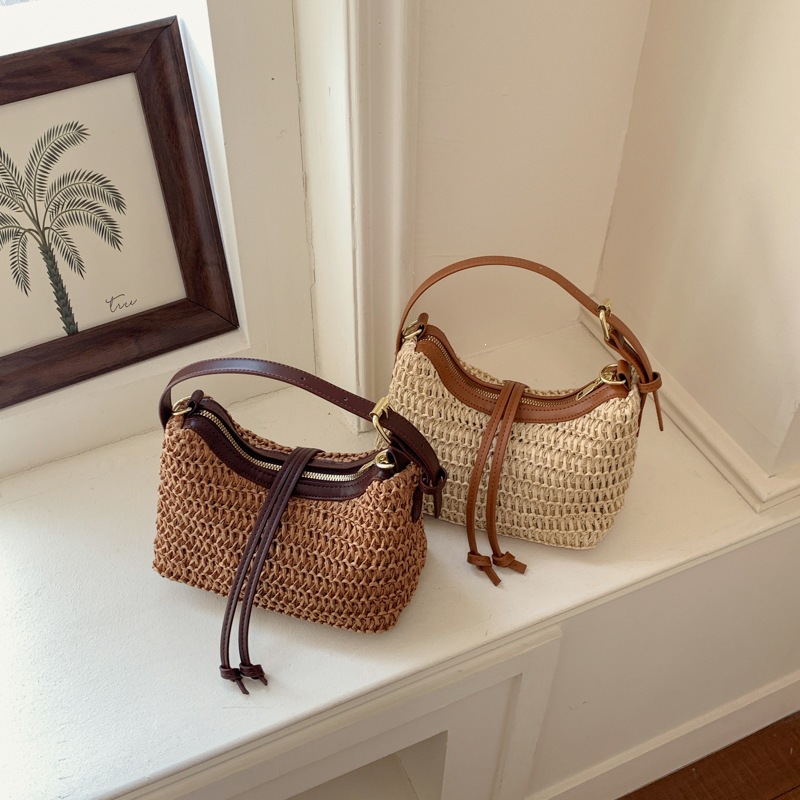 Nicho Zhong vacaciones de verano bolsas de paja nuevas bolsas de mano de viaje de mujer ocio diario viaje de viaje temperamento bolsas de cubo caqui
