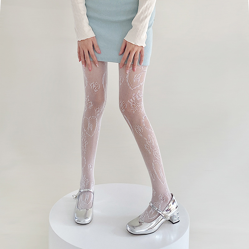 Red de pesca calcetines de primavera y verano delgados huecos grandes flores inins sexy puro amor Jacquard anti-hock pantalones