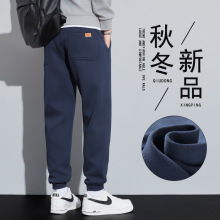 休闲卫运动裤男2025秋季新款宽松束脚裤潮牌哈伦百搭款运动长裤子