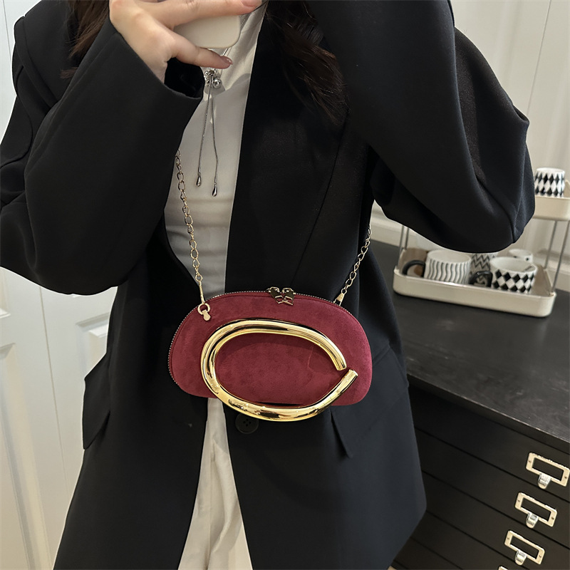2025 nuevo bolso de moda de mujer caja redonda mano agarrada mini bolsa de metal retro cadena de hombro bolso de hombro