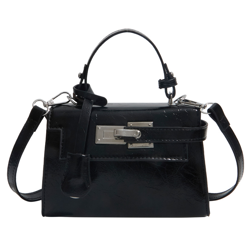 Nicho de diseño Kylie bolso mujer 2026 nuevo bolso pequeño bolso portátil mochila simple sensación cotidiana de viaje bolsa de hombro