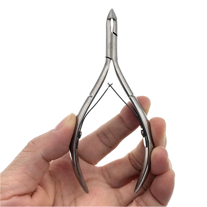 Factory wholesale nail art dead skin scissors to remove dead skin stainless steel double fork sharp round head dead skin scissors manicure edge