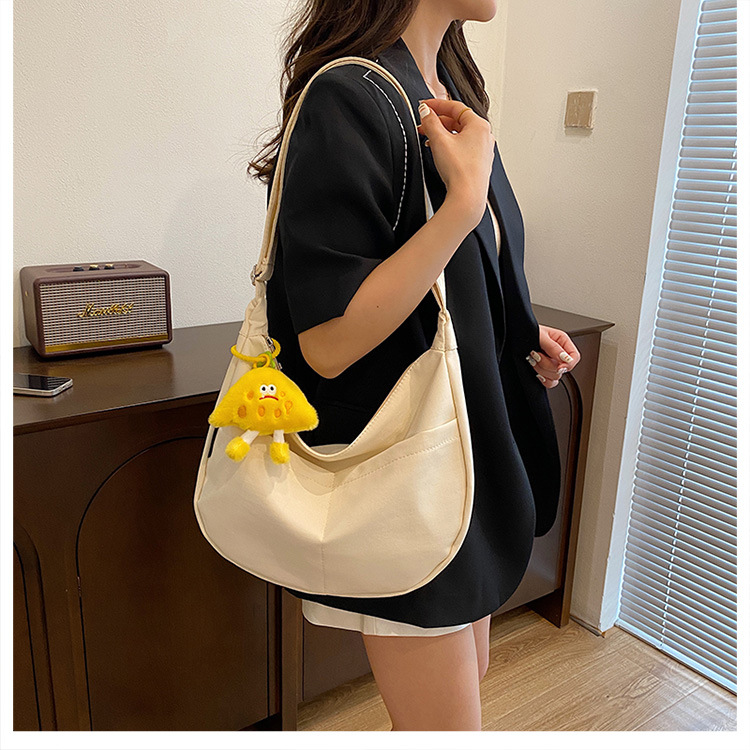 Simple solid-color canvas bag 2024 new style Japanese large-capacity single-shoulder dumpling bag, versatile for school and commuting crossbody bag undefined