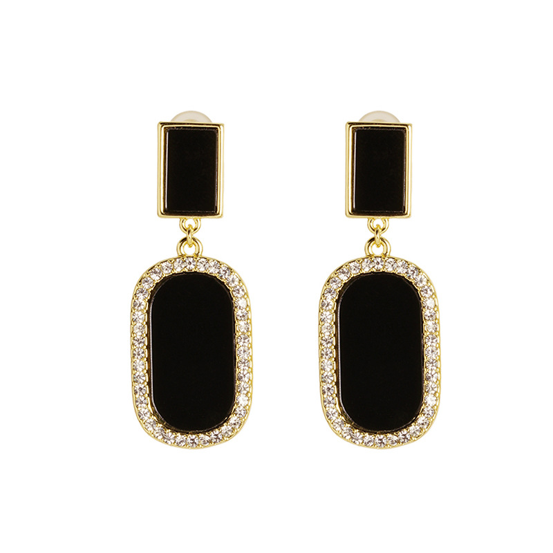 Vietnam Sha Jin moda elíptica micro-instalación de piedra de ojo de gato aleación de cobre de estilo europeo y americano joyas transfronterizas orejas no se desvanecen