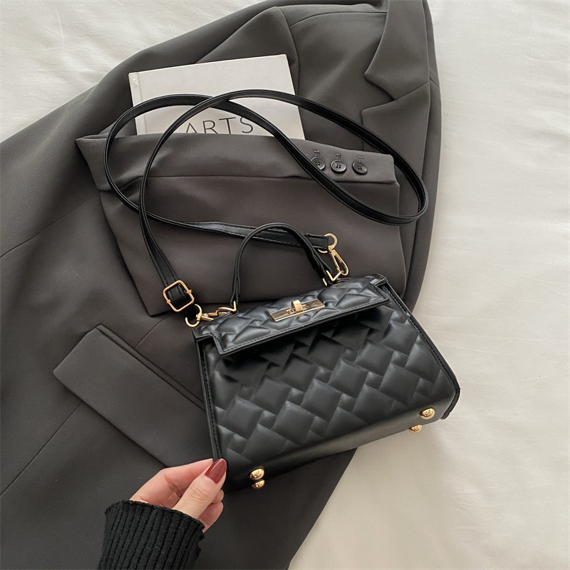 Bolso de mano con cerradura de cercanías para mujer 2024 otoño e invierno nuevo estilo salvaje ins diseño de nicho bolso salvaje ins Kelly