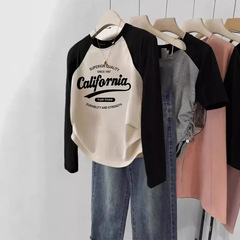大きいサイズの婦人服の純綿は肩の長袖のtシャツを挿します。