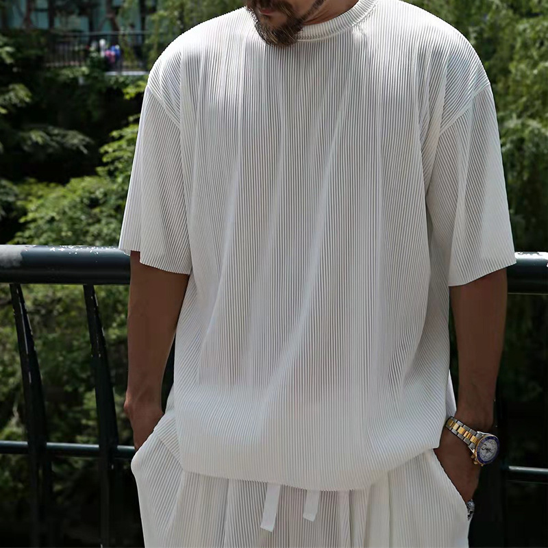 2022 estación independiente de verano europeo y americano rayas verticales de los hombres traje suelto pantalones cortos de manga corta de color sólido traje deportivo casual