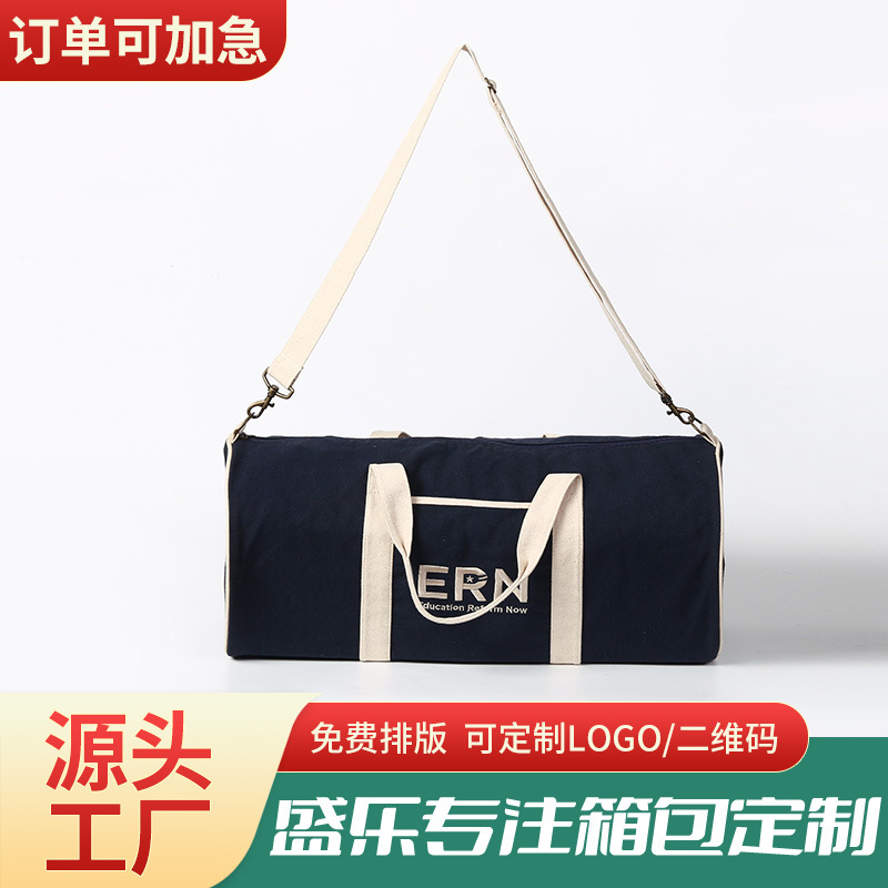 厂家供应12安帆布旅行包大容量出差旅行健身行李包户外收纳运动包