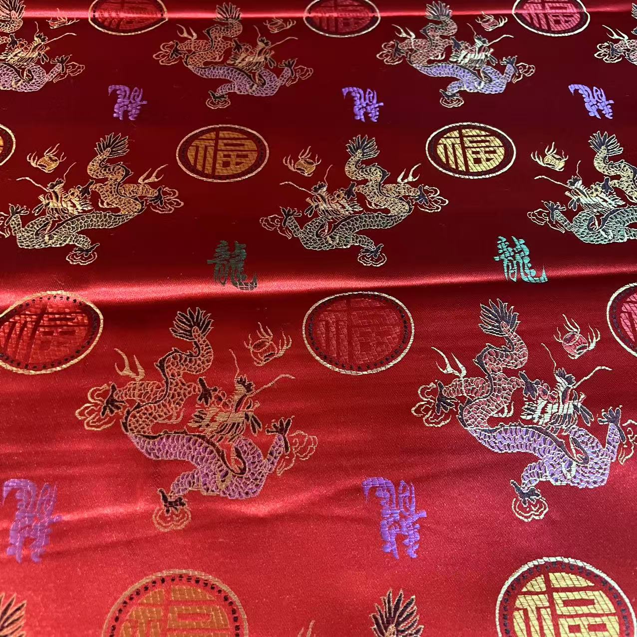 供应织锦缎,寿衣面料。