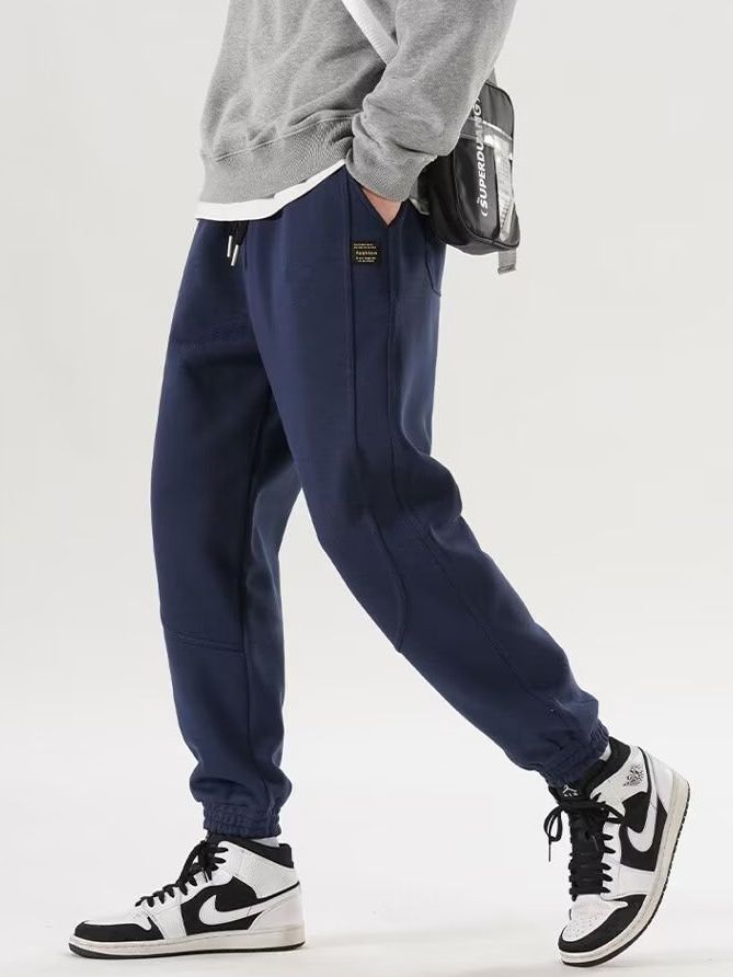 Camisa menos ropa pantalones de chándal para niños Otoño e Invierno Nuevos pantalones casuales engrosados forrados de lana pantalones ajustados de moda Pantalones deportivos sueltos