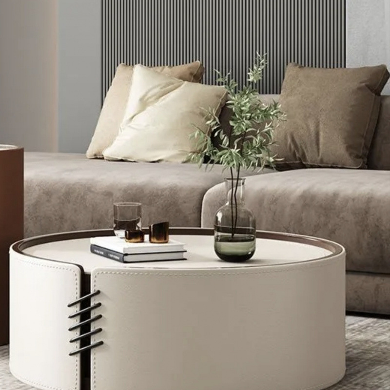 대형 원형 커피 테이블과 미색 슬레이트 석재 조리대