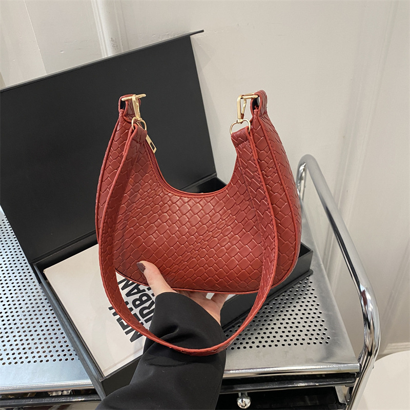 Bolsa de media luna francesa de tejido para mujeres 2025, primavera, nueva moda, textura de moda, bolso de hombro, elegante bolso de brazo