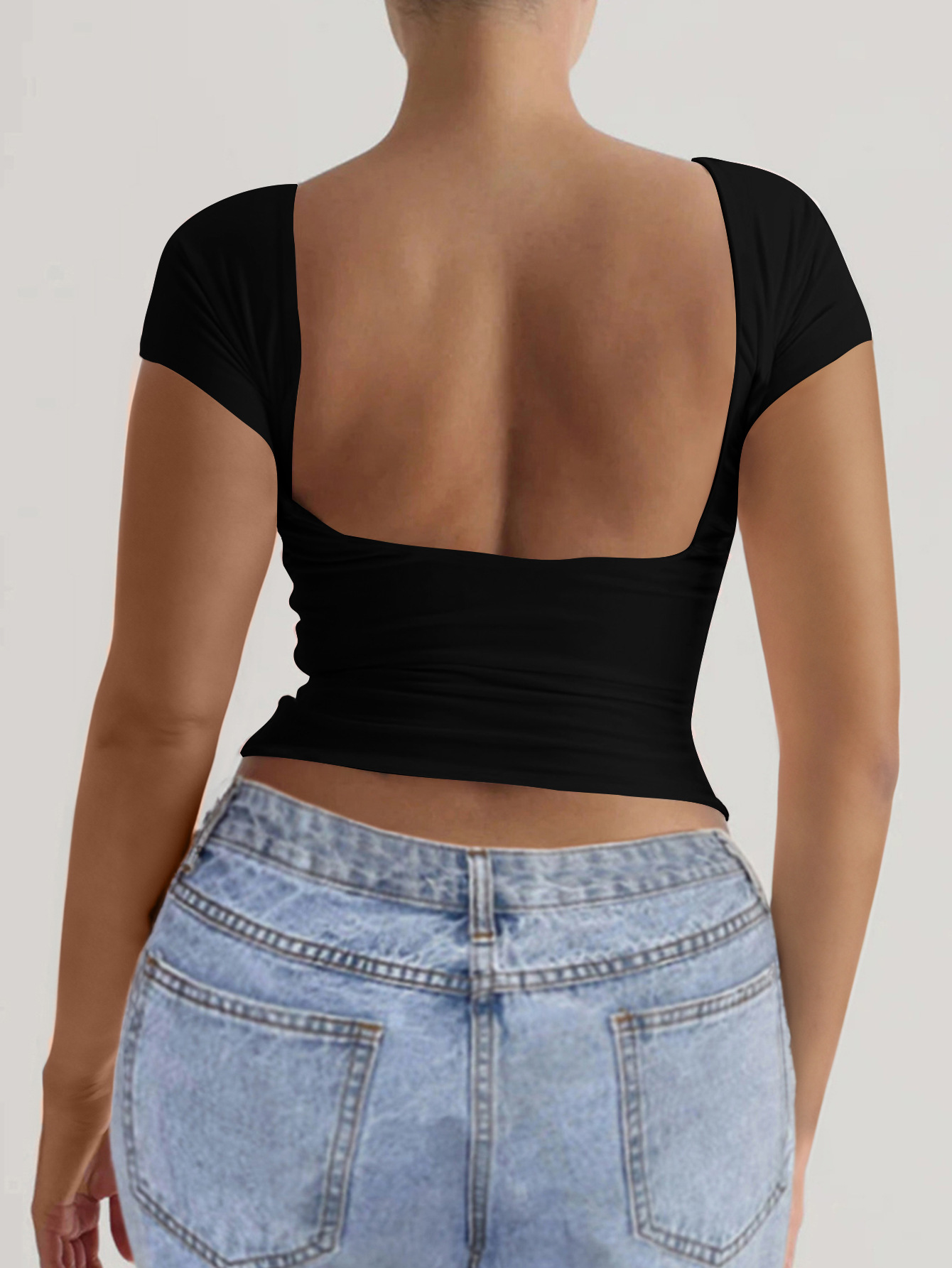 91g Weight Short Sleeve Sleeve Length Pullovers Placket Type Regular Sleeve Sleeve Type Spandex, Viscose fiber Fabric Type Regular Top Length T-shirt Tops Type Daily Occasion Round Neck Neckline Comfort Function Slim Fit Type Solid Color Pattern 2025 Spring and Summer Season Women's Gender Backless Design Streetwear Style Wholesale Women's Streetwear Solid Color Short Sleeve Backless T-Shirts 20