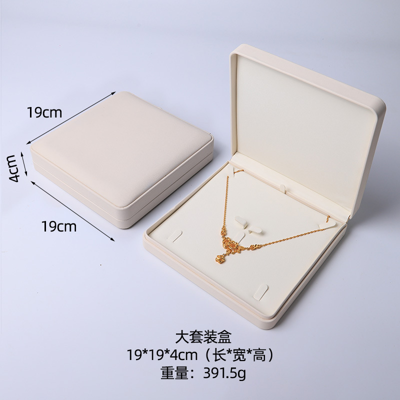 Caja de joyería rosa de alta calidad de cuero pu caja de embalaje de marca de joyería logotipo colgante pulsera collar caja de anillo