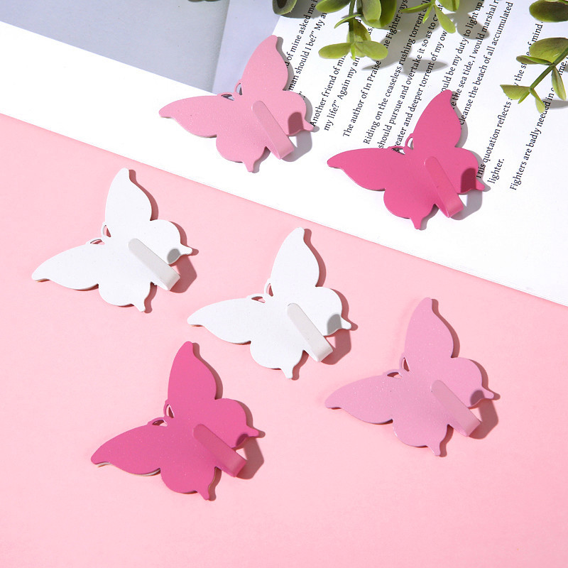 Gancho de mariposa fuerte sin agujeros ins viento encantador gancho adhesivo de corazón de niña decoración de pared de habitación gancho adhesivo de alto valor visual