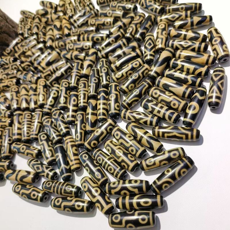 メーカー歯黄包糊九眼12 × 38mm天珠歯黄風化古法包糊瑪瑙天珠【a級】|undefined