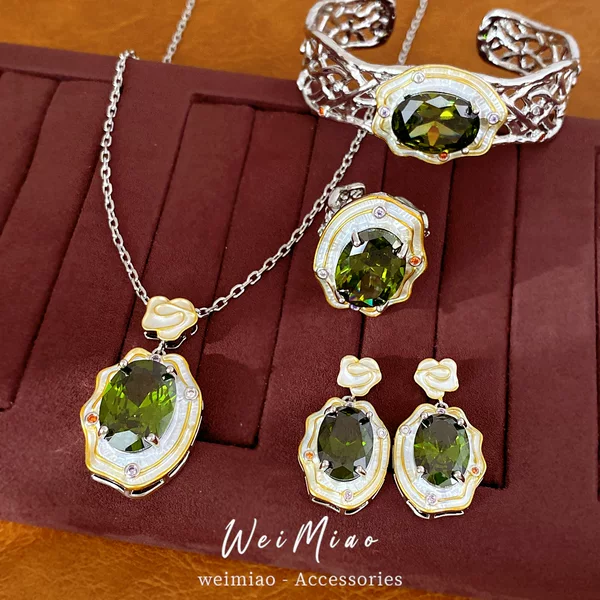 18k real gold-plated silver needle cubic zirconia oval pendant necklace, earrings, bracelet, and ring set – a unique collection of accessories
