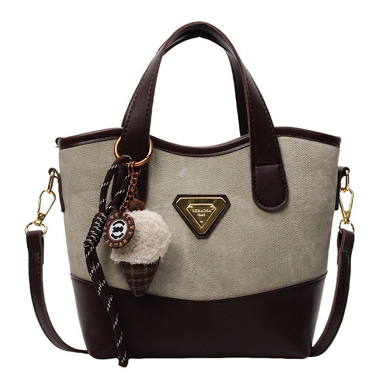 Bolso de mano de color de contraste de estilo explosivo de comercio exterior para mujer 2025 nuevo bolso de mensajero de moda salvaje bolso de cubo de ocio retro