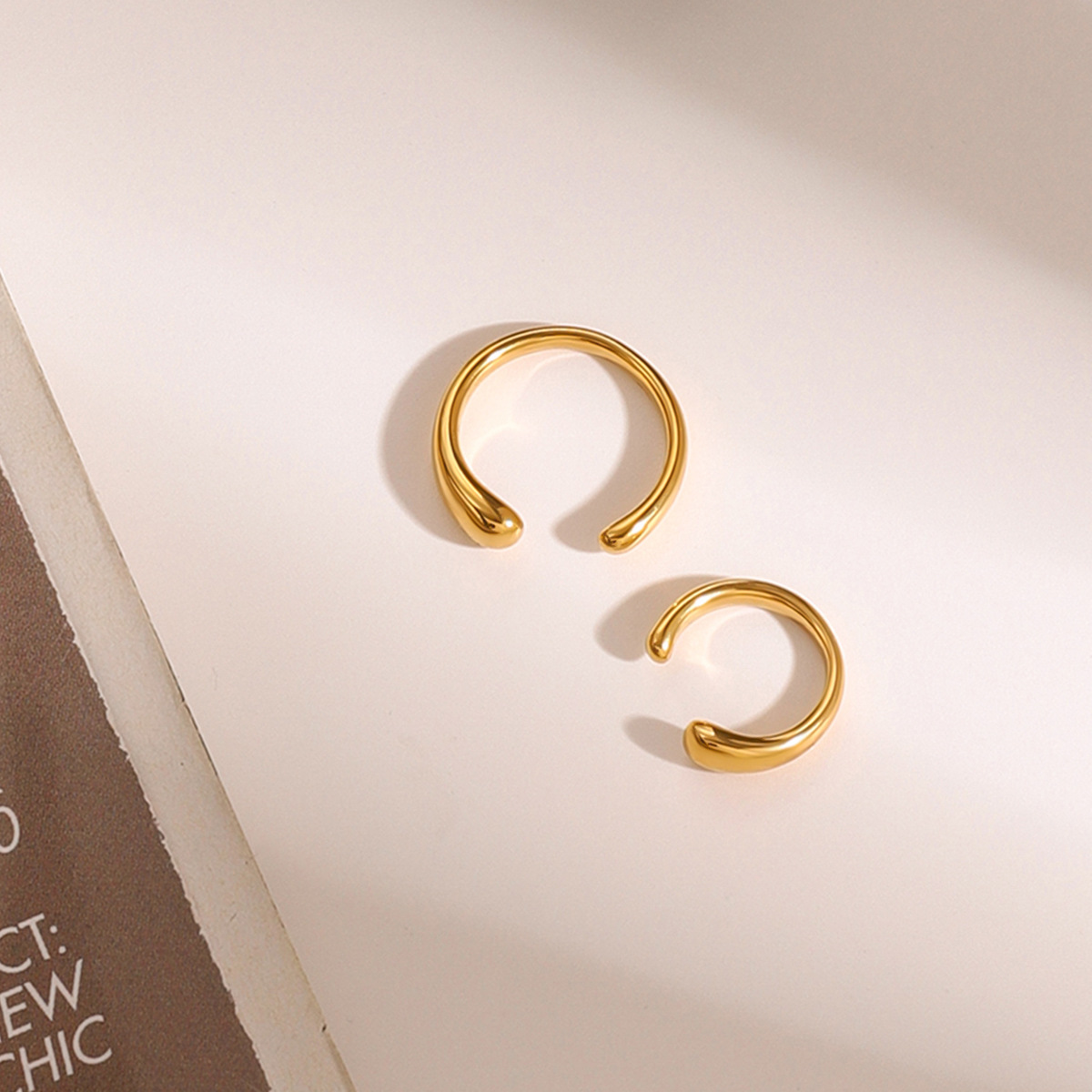 JEDING europa y americana acero inoxidable orejas de oro sensación de alto nivel sin agujeros de orejas huesos de acero de aluminio pendientes transfronterizos