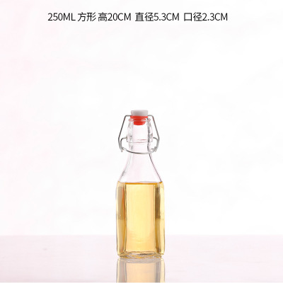 Bloquear botella de vidrio transparente redonda hebilla cuadrada botella de vidrio jugo botella de vino enzima botella de vino de cerveza casera botella de vino blanco botella vacía