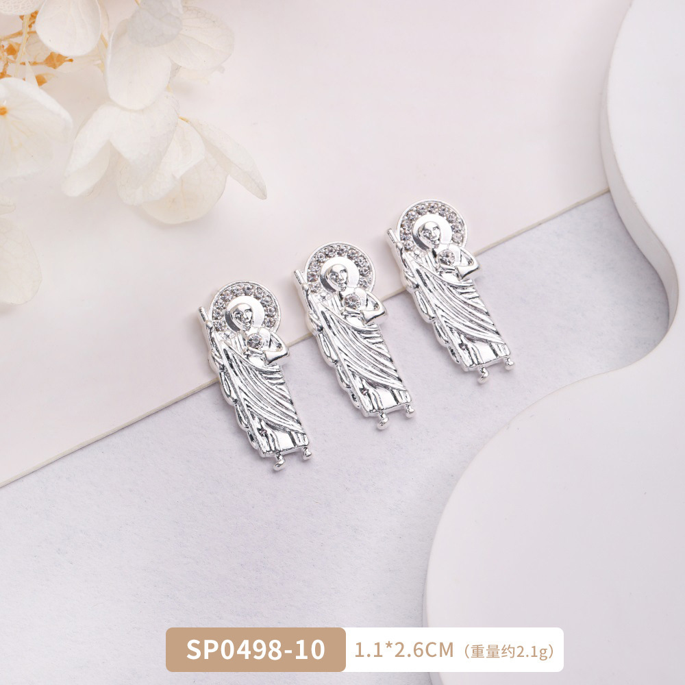 Arte de uñas transfronterizo Jesús accesorios de metal DIY vintage metal aleación uñas arte joyería europea y americana Luz de lujo accesorios con diamante