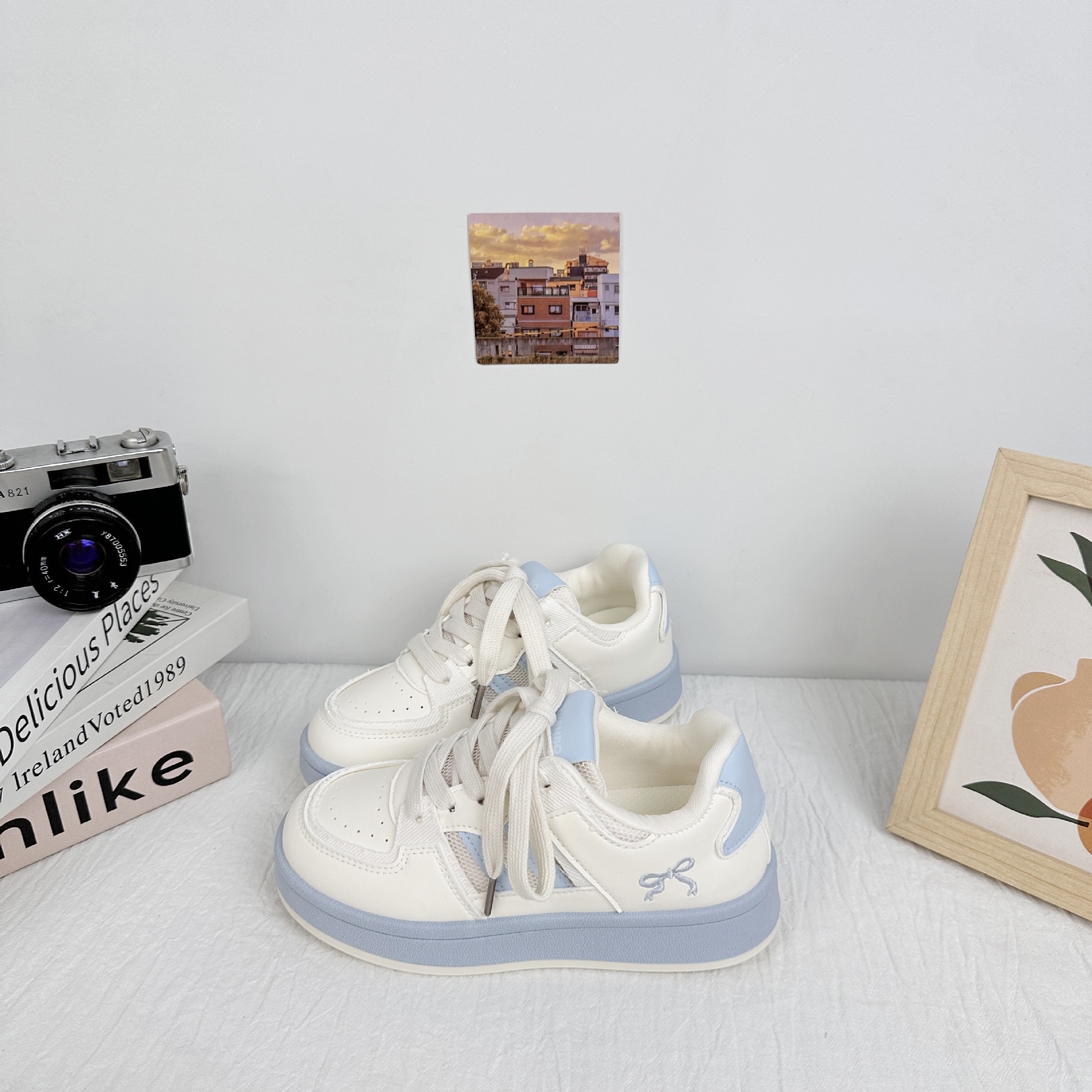 Zapatillas de plataforma de onda lejana para mujer 2025 nuevos zapatos blancos de todo fósforo de primavera y verano zapatos de pan casuales de estilo femenino dulce generación