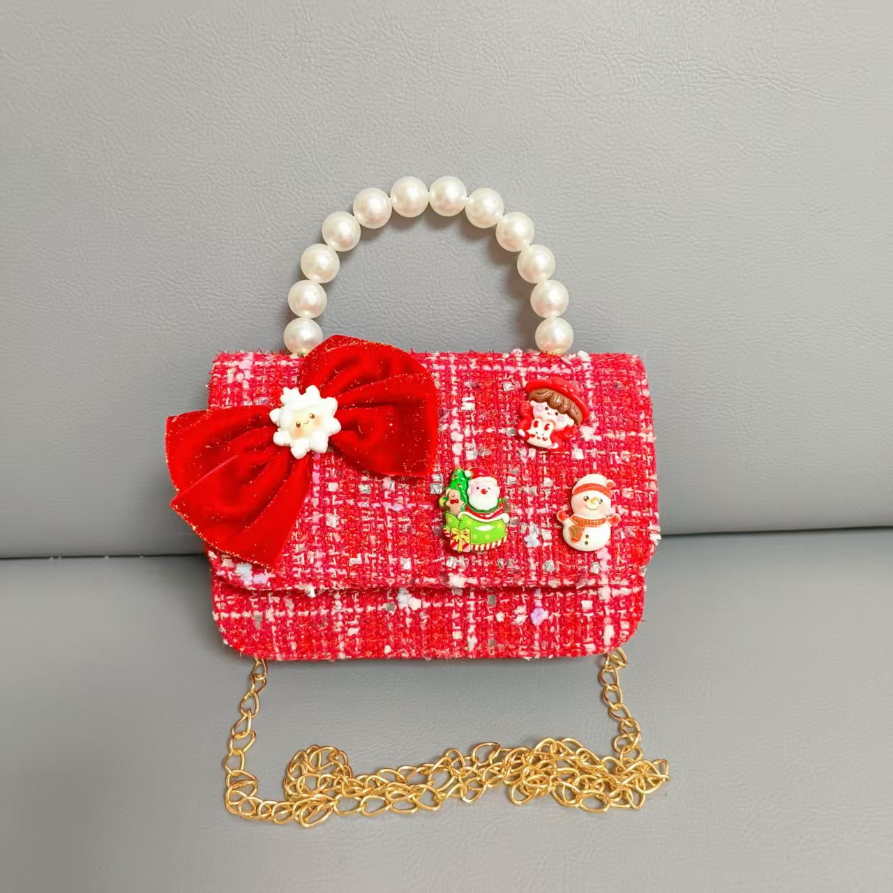 Cartera de Año Nuevo rojo arco de papá Noel bolso de perla pequeña cadena de viento fragante bolso de hombro