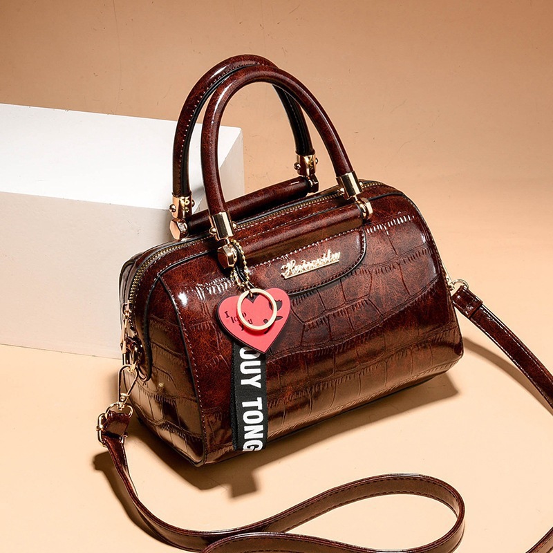 Bolso de textura 2025 nuevo bolso de hombro con diseño de patrón de piedra, bolso de mensajero universal de asistencia informal, bags transfronterizos